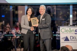 Carol Liao receiving Clean50 award